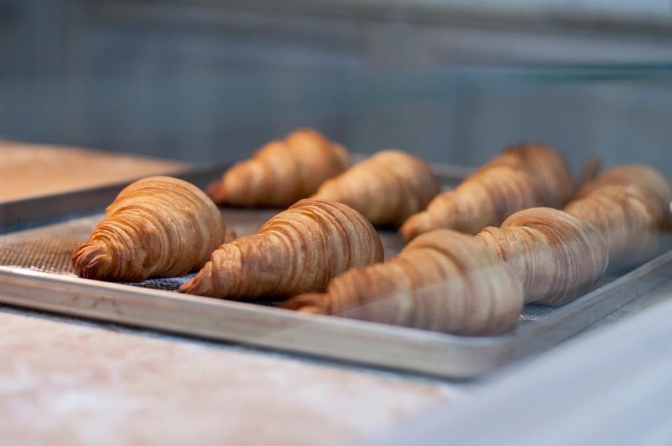 Butter croissants on a baking tray