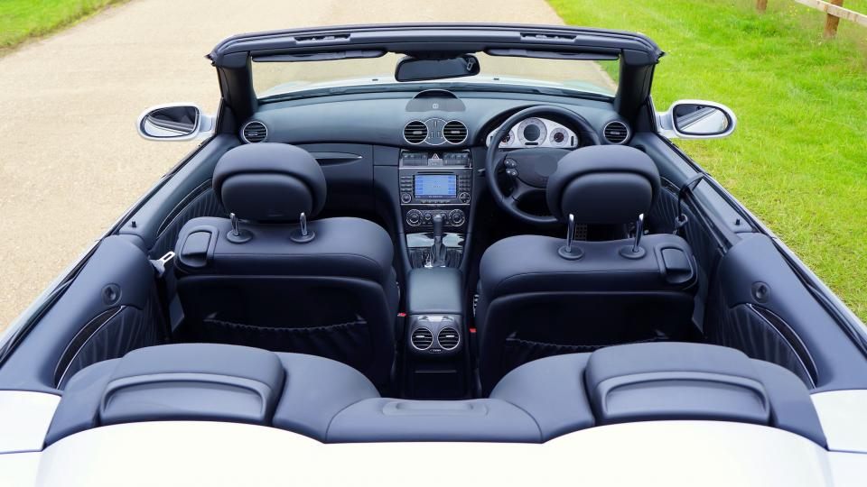 Car cabin with four sculpted seats seen from above