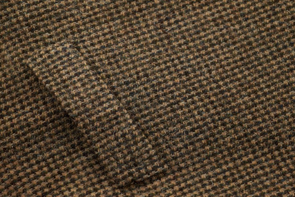 Close-up of brown tweed fabric
